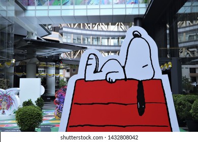 Bangkok/Thailand - June 16th, 2019. Snoopy Sleep On Red House Cute Peanuts Comics Character Paperwork With Colorful Background At Department Store. Snoopy Is Charlie Brown's Beagle Dog In The Comic.