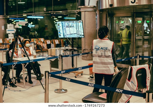 BANGKOK/THAILAND - JUNE 2020: Temperature\
Screening Point at the entrance of Suvarnabhumi Airport 1st floor.\
The Fever Control check due to COVID-19. AOC preventive measure\
from\
coronavirus