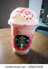 Bangkok/Thailand - Mar 8 2018 : Starbucks Coffee Strawberry Honey Blossom Creme Frappuccino On Wooden Table