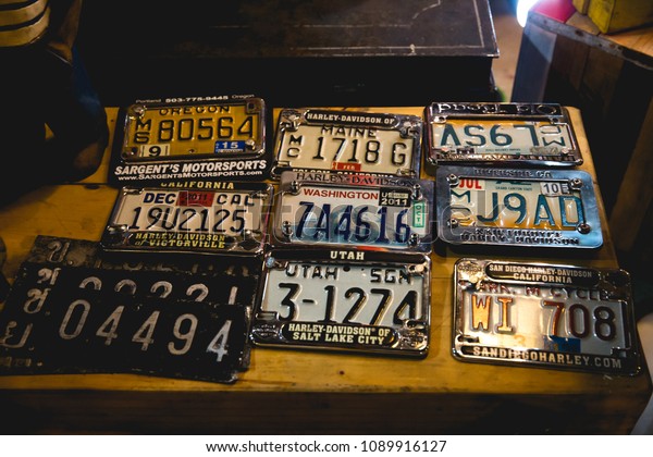 Bangkok,Thailand -\
May 13 ,2018 : Group of vintage old American license plates in the\
train night market \
Srinakarin\

