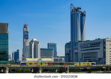Bangkok-Thailand Oct 24, 2020: BTS Sky train run go to Siam  station passing Central World Departmentstore in day time.