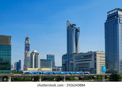 Bangkok-Thailand Oct 24, 2020: BTS Sky train run go to Siam  station passing Central World Departmentstore in day time.