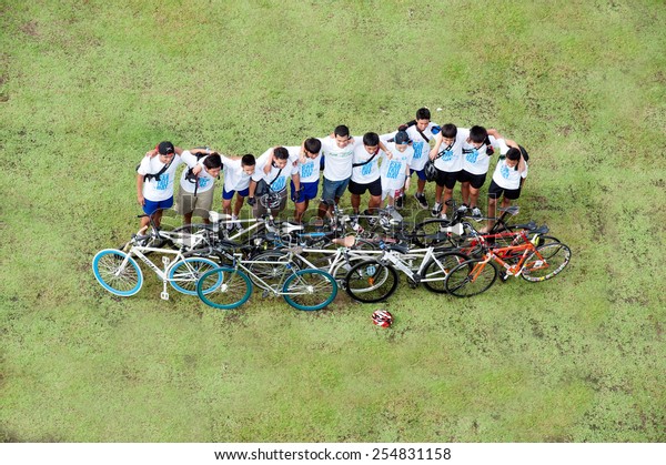 BANGKOK,THAILAND - SEPTEMBER  22 :\
Group of  Cyclist posing in Car Free Day event at Sanam Luang near\
Grand Palace on September 22, 2013 in Bangkok capital of\
Thailand.