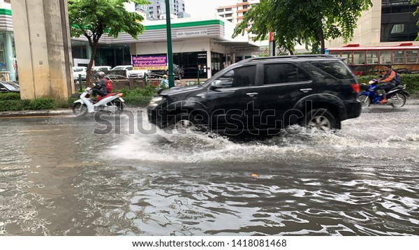 BANGKOK,THAILAND-7jun. 2019 :\
after the heavy rain in Bangkok, Phaholyothin road in Phayathai\
district turn into the canal , flooding covered all lanes and make\
a traffic\
jam.