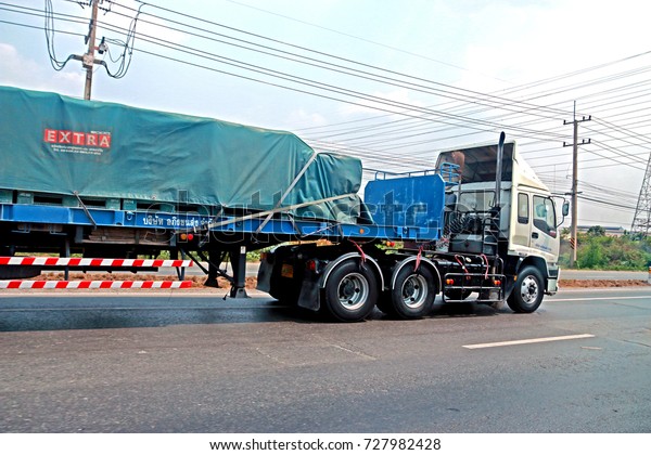 BANGKOK-THAILAND-APRIL 19 : The\
transportation truck on the road in the city, April 19, 2016\
Bangkok,\
Thailand