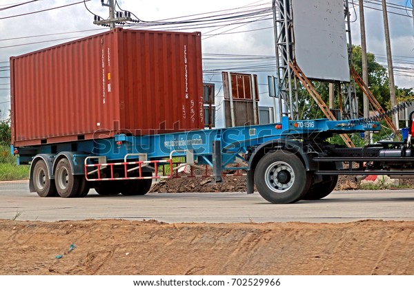 BANGKOK-THAILAND-AUGUST\
3 : Container transportation truck on the road in the city on\
August 3, 2017 Bangkok,\
Thailand