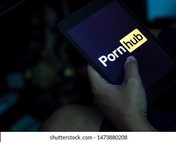 Bangkok,Thailand-August 6,2019.The man he watching Pornhub from ipad at night.
