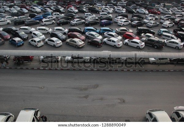 Bangkok,Thailand,January 16,2018\
Many vehicles\
are parking at a facility in Chatuchak\
district