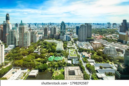 BANGKOK,THAILAND-JULY30 2020:Green Tree Area Among High Office Building,central Business District, Sukhumvit Area On Clear Day.