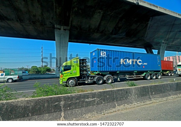 BANGKOK-THAILAND-MARCH 19 : The transportation\
truck & car on highway in the city of Thailand, March 19, 2018\
Bangkok,\
Thailand