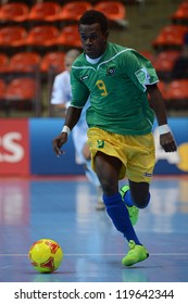 BANGKOK,THAILAND-NOV 09:Micah Leaalafa Of Solomon Islands Runs With The Ball During The FIFA Futsal World Cup Between Solomon Islands And Guatemala At Indoor Stadium Huamark On Nov9,2012 In,Thailand.