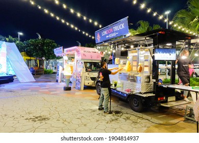 BANGKOK,THAILAND-Nov 2020-Chef is cooking and selling food at outdoor street food night market. Market Stalls. Outdoor market. Food Event. Food Fair. Festival. Flea Market. Festive. 