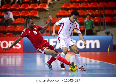 BANGKOK,THAILAND-NOVEMBER 05:Ali Hassanzadeh (white) Of Iran In Action During The FIFA Futsal World Cup Between Morocco And Iran At Indoor Stadium Huamark On Nov5, 2012 In Bangkok,Thailand.