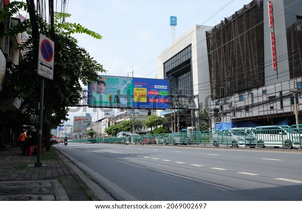 BANGKOK,THAILAND-November 1,2021: LED Billboard\
with COVID-19 Update information. On 1 November, 2021, Thailand\
reopening , Official welcoming fully vaccinated visitors from\
around the\
world.