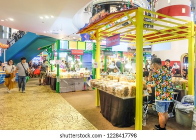 BANGKOK,THAILAND-November 2018-People And Tourist Walking, Eating, Buying Food At Indoor Street Food Market Festival. Market Stalls. Indoor Market . Food Event. Food Fair. Festival. Concert. Shopping 