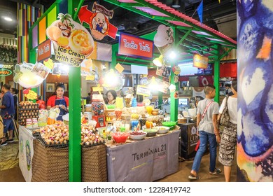 BANGKOK,THAILAND-November 2018-People And Tourist Walking, Eating, Buying Food At Indoor Street Food Market Festival. Market Stalls. Indoor Market . Food Event. Food Fair. Festival. Concert. Shopping 