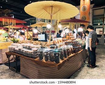 
BANGKOK,THAILAND-November 2019-People And Tourist Walking, Buying And Shopping At ICON Indoor Street Food Night Market. Market Stalls. Outdoor Market. Food Event. Food Fair. Festival. Flea Market.