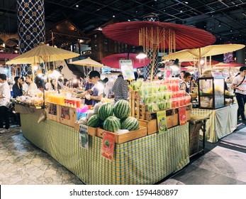 
BANGKOK,THAILAND-November 2019-People And Tourist Walking, Buying And Shopping At ICON Indoor Street Food Night Market. Market Stalls. Outdoor Market. Food Event. Food Fair. Festival. Flea Market.