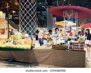 
BANGKOK,THAILAND-November 2019-People And Tourist Walking, Buying And Shopping At ICON Indoor Street Food Night Market. Market Stalls. Outdoor Market. Food Event. Food Fair. Festival. Flea Market.