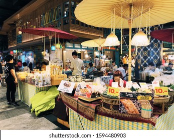 
BANGKOK,THAILAND-November 2019-People And Tourist Walking, Buying And Shopping At ICON Indoor Street Food Night Market. Market Stalls. Outdoor Market. Food Event. Food Fair. Festival. Flea Market.