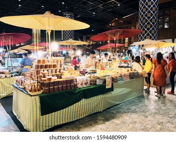 
BANGKOK,THAILAND-November 2019-People And Tourist Walking, Buying And Shopping At ICON Indoor Street Food Night Market. Market Stalls. Outdoor Market. Food Event. Food Fair. Festival. Flea Market.