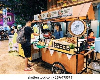 
BANGKOK,THAILAND-November 2019-People And Tourist Walking, Buying And Shopping At ICON Indoor Street Food Night Market. Market Stalls. Outdoor Market. Food Event. Food Fair. Festival. Flea Market.