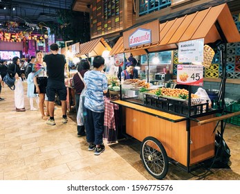 
BANGKOK,THAILAND-November 2019-People And Tourist Walking, Buying And Shopping At ICON Indoor Street Food Night Market. Market Stalls. Outdoor Market. Food Event. Food Fair. Festival. Flea Market.