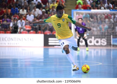 BANGKOK,THAILAND-NOVEMBER18:Je (yellow) Of Brazil In Action During The FIFA Futsal World Cup Final Between Spain And Brazil At Indoor Stadium Huamark On Nov18, 2012 In,Thailand.