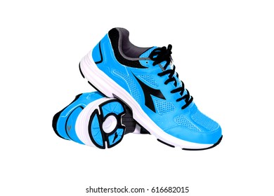 BANGKOK,THAILAND-October 2 ,2016:Diadora new blue ultra boots shoes for running on white background illustrative editorial.