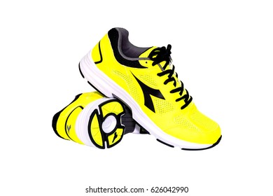 BANGKOK,THAILAND-October 2 ,2016:Diadora new yellow boots shoes for running illustrative editorial