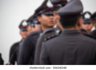 Bangkok-Thailand-October 22, 2016 : Blurred image for background of police take care crowds of Thai people mourners of His Majesty King Bhumibol Adulyadej at the Grand Palace.