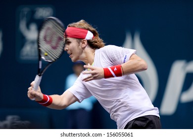 BANGKOK,THAILAND-SEP 24:Lukas Lacko Of Slovakia In Action During  Match Against Alejandro Falla Of Colombia At Thailand Open On September24, 2013 At Impact Arena,Bangkok,Thailand 