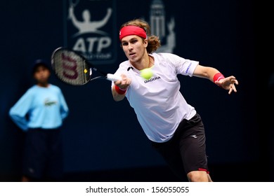 BANGKOK,THAILAND-SEP 24:Lukas Lacko Of Slovakia Returns A Shot During Match Against Alejandro Falla Of Colombia At Thailand Open On September24, 2013 At Impact Arena,Bangkok,Thailand 