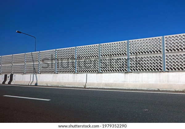 BANGKOK-THAILAND-SEPTEMBER 27 : Detail of the\
noise barrier on the road in the city of Thailand, September 27,\
2018, Bangkok,\
Thailand.