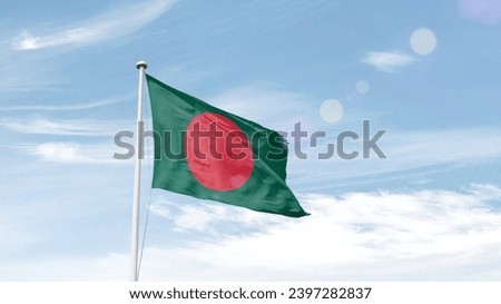 Bangladesh national flag waving in the sky.