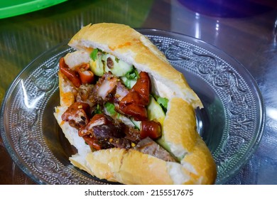 Banh Mi Pha Lau - Vietnamese bread with topping from beef (meat) and offal