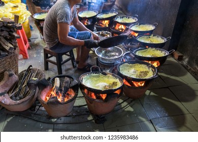 Banh xeo, Vietnamese traditional street food yellow crispy rice flour cake. Sizzling cake, named for the loud sizzling sound it makes when the rice batter is poured into the hot skillet