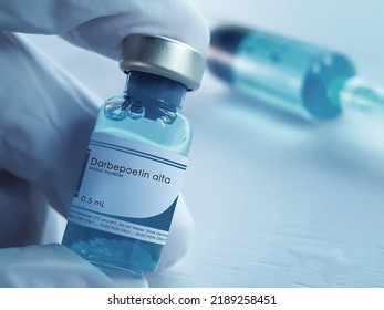 Banja Luka, Bosnia And Herzegovina - 18th November 2020: Darbepoietin Alfa Medical Bottle And Syringe Of Synthetic Erythropoietin Used To Treat Anemia, Chronic Kidney Failure And Chemothrapy