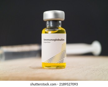 Banja Luka, Bosnia And Herzegovina - 26th August 2021: Imunnoglobulin Injection Medical Bottle On Table Used For Diagnosis And Therapy As Monoclonal Antibody Therapy