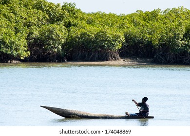 BANJUL, GAMBIA - MAR 14, 2013: Unidentified Gambian fisher men on a boat in Gambia, Mar 14, 2013. Major ethnic group in Gambia is the Mandinka - 42%