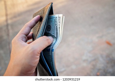 Bank of Dollars in black wallet
