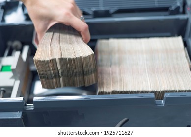 Bank Employees Sorting And Counting Money Inside Bank Vault. Large Amounts Of Money In The Bank.