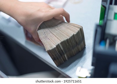 Bank Employees Sorting And Counting Money Inside Bank Vault. Large Amounts Of Money In The Bank.