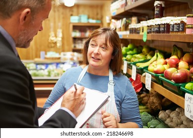 Bank Manager Meeting With Female Owner Of Farm Shop