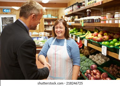 Bank Manager Meeting With Female Owner Of Farm Shop