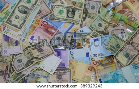 Bank notes from all over the world forming a background