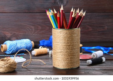 Bank For Pencils With Hearts Wrapped With String On A Wooden Table. Handmade.  Pencil Holder.