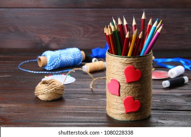 Bank For Pencils With Hearts Wrapped With String On A Wooden Table. Handmade. Pencil Holder.