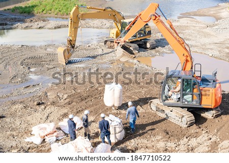 Similar – Construction site with excavation pit and foundation