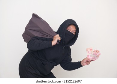 Bank Robber Wearing Black Balaclava And Hoodie For Disguise, Managed To Rob A Bank And Run Away With A Bag Full Of Money